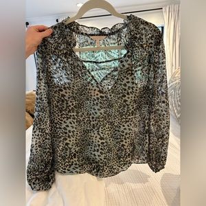 Rebecca Taylor teal leopard print top. “Lynx tie sage leopard print blouse.”